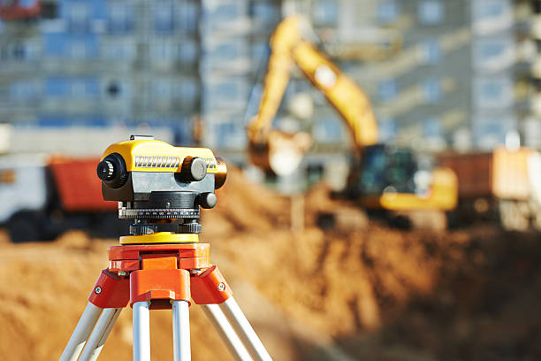 Surveyor equipment tacheometer or theodolite outdoors at construction site